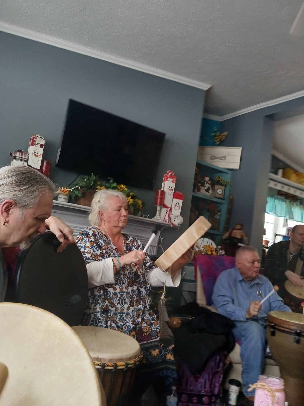 Community drum circle at Divine Healing Corner