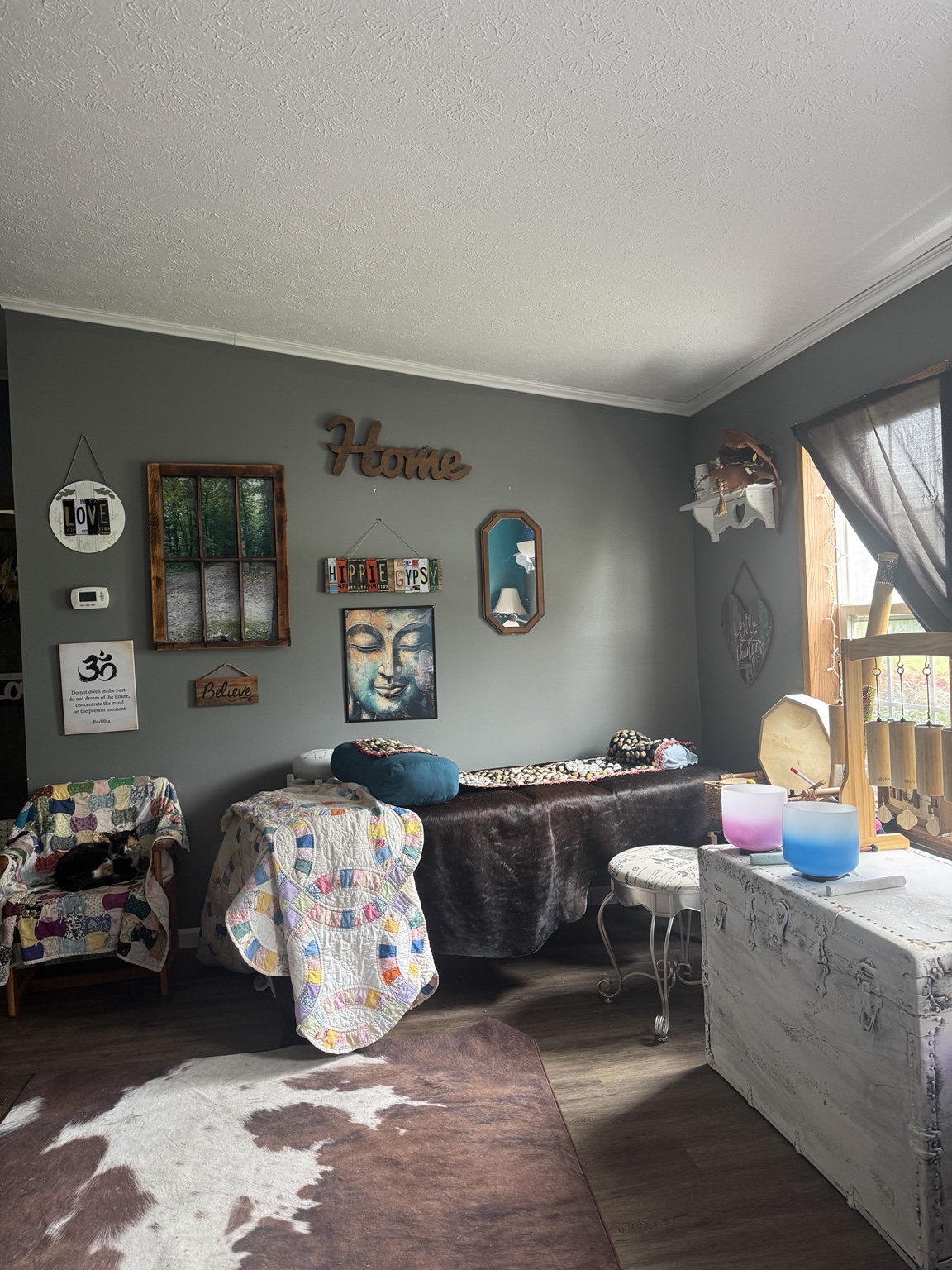Sound healing space with table, bowls and chimes
